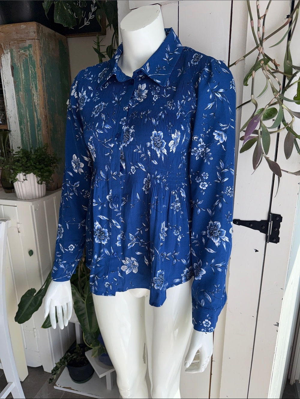 Suzy Shier royal blue long-sleeve floral blouse from the Canadian retailer